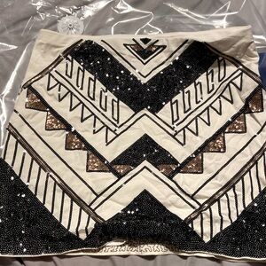 Size large stretchy sequined skirt. From express worn once
